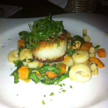 Jaguar Restaurant - Coconut Grove - SCALLOP NORMA (pictured) Served over sweet potato, corn, spinach and hearts of palm - Latin American Near Me - Miami, Florida