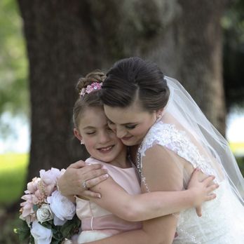 Live Happy Studio - Flower girl Maddison and bride Devin. This is one many many beautiful raw moments this amazing team was able to capture. - Videographers Near Me - Orlando, Florida Live Happy Studio - Flower girl Maddison and bride Devin. This is one many many beautiful raw moments this amazing team was able to capture. - Videographers Near Me - Orlando, Florida