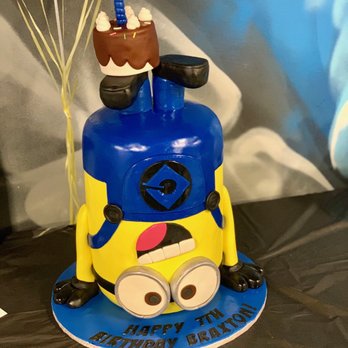 Sugar Pearl Bakery - a cake with a minion on top - Bakeries Near Me Sugar Pearl Bakery - a cake with a minion on top - Bakeries Near Me