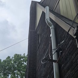I wish I had a before pic, but they got my previously leaning chimney back against the wall and secure! One less thing to worry about!