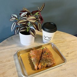 Smoked salmon and avocado toast and latte Smoked salmon and avocado toast and latte