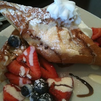 Starling Diner - Broiled baguette stuffed with marscapone and creme fraiche topped with fresh berries and whipped cream. - New American Near Me - Long Beach, California Starling Diner - Broiled baguette stuffed with marscapone and creme fraiche topped with fresh berries and whipped cream. - New American Near Me - Long Beach, California
