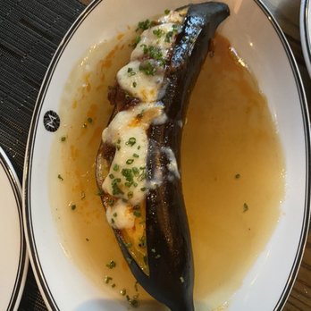 Marabu Restaurant - Char roasted Sweet Plantain topped with melted queso, bacon and a Maple Bacon syrup - Cuban Near Me - Miami, Florida Marabu Restaurant - Char roasted Sweet Plantain topped with melted queso, bacon and a Maple Bacon syrup - Cuban Near Me - Miami, Florida