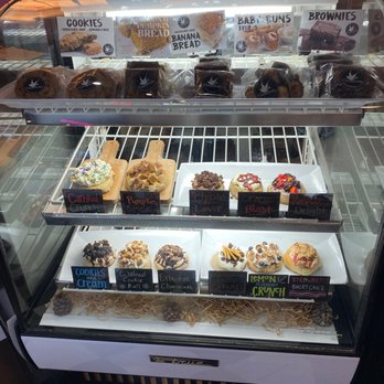 Cinnaholic - Cold case with example buns and baked goods (packaged) above - Desserts Near Me - Atlanta, Georgia Cinnaholic - Cold case with example buns and baked goods (packaged) above - Desserts Near Me - Atlanta, Georgia