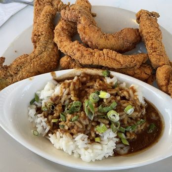 Steve's Marina Restaurant - Catfish with rice and gravy - Seafood Near Me - Long Beach, Mississippi Steve's Marina Restaurant - Catfish with rice and gravy - Seafood Near Me - Long Beach, Mississippi