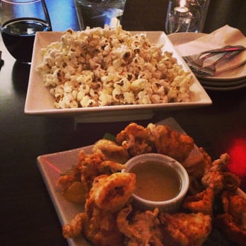 The Common - Calamari and Truffle Popcorn - Lounges Near Me - Edmonton, Alberta The Common - Calamari and Truffle Popcorn - Lounges Near Me - Edmonton, Alberta