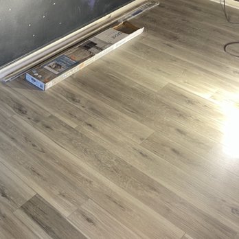 Zion Improvements - a hardwood floor being installed - Flooring Near Me Zion Improvements - a hardwood floor being installed - Flooring Near Me