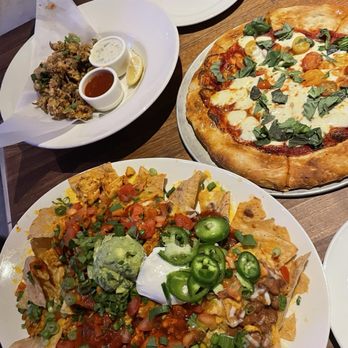 Yard House - Chicken Nachos, Margherita pizza, Fried Calamari - New American Near Me - Sacramento, California Yard House - Chicken Nachos, Margherita pizza, Fried Calamari - New American Near Me - Sacramento, California