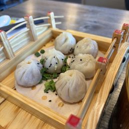 thumb-sized pan-fried buns