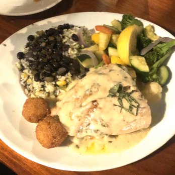 Pompano Joe's - Bajan fish with side of black beans and rice and veggies - Seafood Near Me - Destin, Florida
