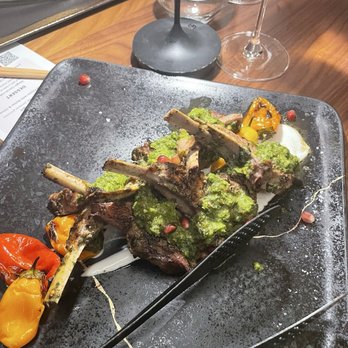 Boketto - Lamb chop has an amazing chimichurri. The pomegranate is really a nice touch. With there was more pomegranate - Steakhouses Near Me - St Louis Park, Minnesota