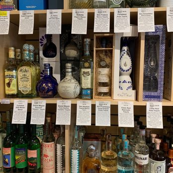 The Wine Connection - a shelf full of liquor bottles - Beer, Wine & Spirits Near Me - Del Mar, California The Wine Connection - a shelf full of liquor bottles - Beer, Wine & Spirits Near Me - Del Mar, California