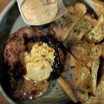 Henni's Kitchen and Bar - Porterhouse Pork chop.  Flavors were great but overcooked. - Burgers Near Me - White Salmon, Washington