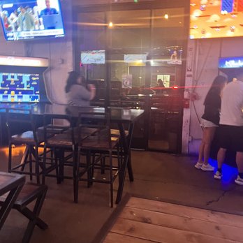 Cidercade Dallas - Door to outside sitting area - Cideries Near Me - Dallas, Texas Cidercade Dallas - Door to outside sitting area - Cideries Near Me - Dallas, Texas