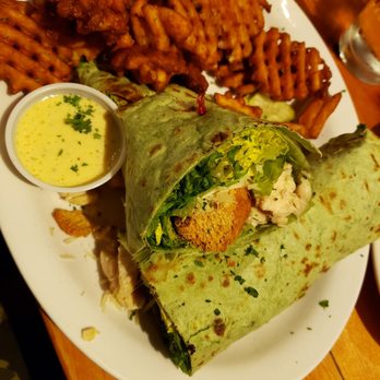 From Scratch Restaurant - Chicken Caesar wrap with waffle cut fries with Caesar dressing (so good). - Breakfast & Brunch Near Me - Carmel, California