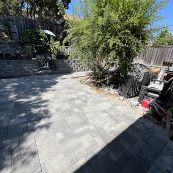 Rightway Remodel - a patio with pavers and a grill - General Contractors Near Me - Santee, California