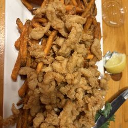 Tozier's Restaurant - The best fried clam strips with sweet potato fries. Onion rings are very good as well!