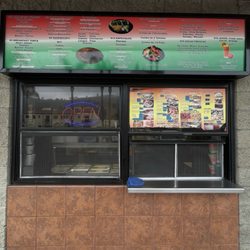 Red Barn Liquors - Outside window and menu