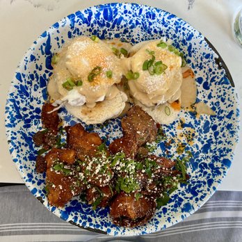 Whiskey Bird - The bao benedict: poached eggs, smoked gouda fondue, chicken sausage w/crispy potatoes. - New American Near Me - Atlanta, Georgia Whiskey Bird - The bao benedict: poached eggs, smoked gouda fondue, chicken sausage w/crispy potatoes. - New American Near Me - Atlanta, Georgia