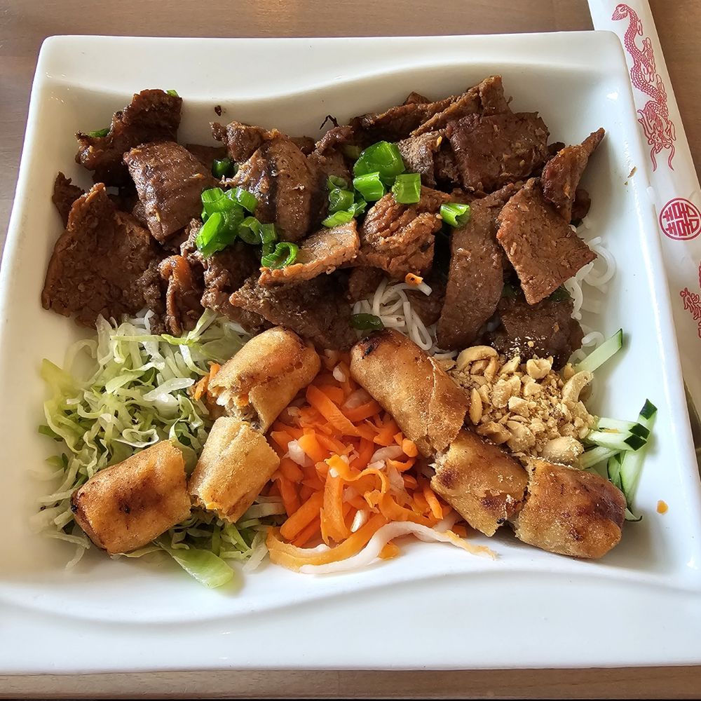 Saigon Cafe Millburn - Grilled beef vermicelli with spring rolls - Vietnamese Near Me - Millburn, New Jersey Saigon Cafe Millburn - Grilled beef vermicelli with spring rolls - Vietnamese Near Me - Millburn, New Jersey