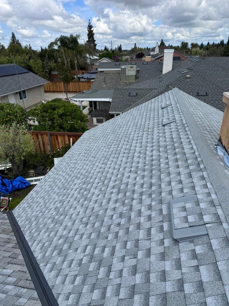 Slide of TAAG Roofing