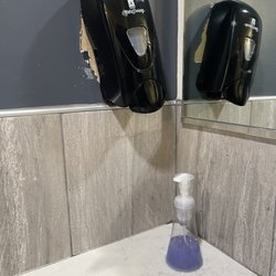 Smart Gym - Soap dispenser/ toilet dispenser has been broken for MONTHS!! They put water in the plastic one when it's running low to make it look full.