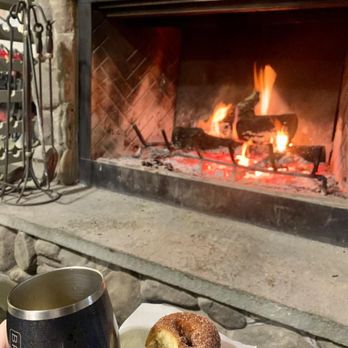 Hilltop Orchards - Enjoying cider and donuts by the fire - Wine Tasting Room Near Me - Richmond, Massachusetts Hilltop Orchards - Enjoying cider and donuts by the fire - Wine Tasting Room Near Me - Richmond, Massachusetts