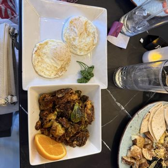 The Wildflower - Chorizo Brussels and fries eggs - Cocktail Bars Near Me - Sanford, Florida
