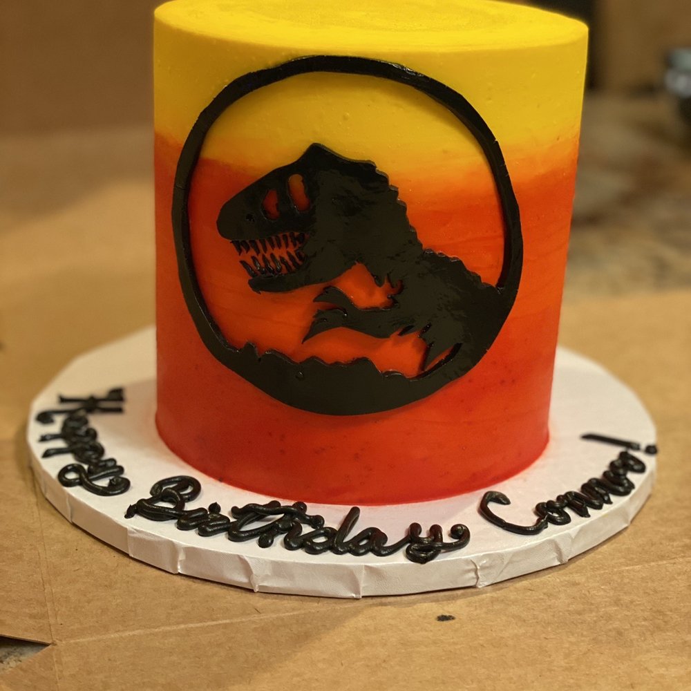 Sunflour Bakeshop - a cake with a dinosaur on it - Cupcakes Near Me - Marlton, New Jersey Sunflour Bakeshop - a cake with a dinosaur on it - Cupcakes Near Me - Marlton, New Jersey