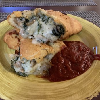 Viney's Italian Kitchen - Calzone with Italian sausage, mushrooms, spinach and black olives! - Italian Near Me - Sonora, California Viney's Italian Kitchen - Calzone with Italian sausage, mushrooms, spinach and black olives! - Italian Near Me - Sonora, California