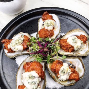Ambitious Cuisine - Crispy Oysters tossed in Buffalo sauce and bleu cheese - Personal Chefs Near Me