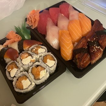 Yoyogi Sushi - Nigiri (tuna, yellowtail, salmon, eel, 2 surf clam) 1 salmon with cream cheese roll - Sushi Bars Near Me - Gaithersburg, Maryland Yoyogi Sushi - Nigiri (tuna, yellowtail, salmon, eel, 2 surf clam) 1 salmon with cream cheese roll - Sushi Bars Near Me - Gaithersburg, Maryland