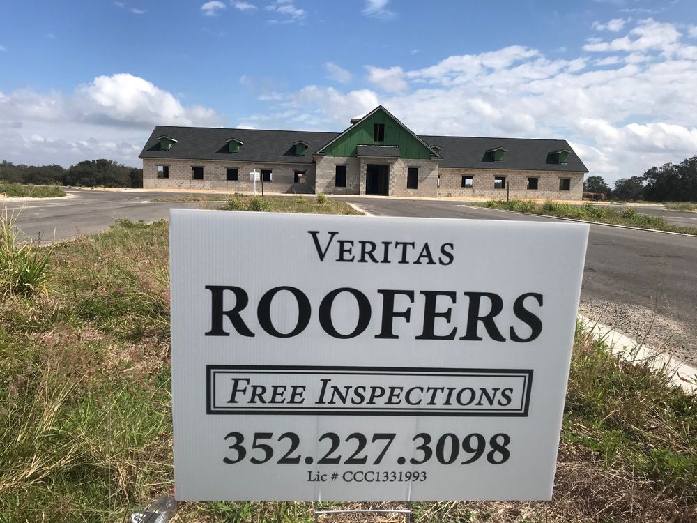 Slide of Veritas Roofers