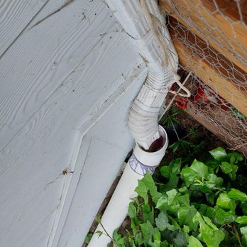 Bainbridge Paint & Design - a close up view of a white pipe with a wire wrapped around it - Painters Near Me Bainbridge Paint & Design - a close up view of a white pipe with a wire wrapped around it - Painters Near Me