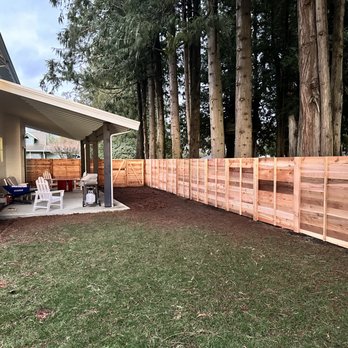 Berserk Construction and Landscape - From the back toward the front of the house. - Fences & Gates Near Me