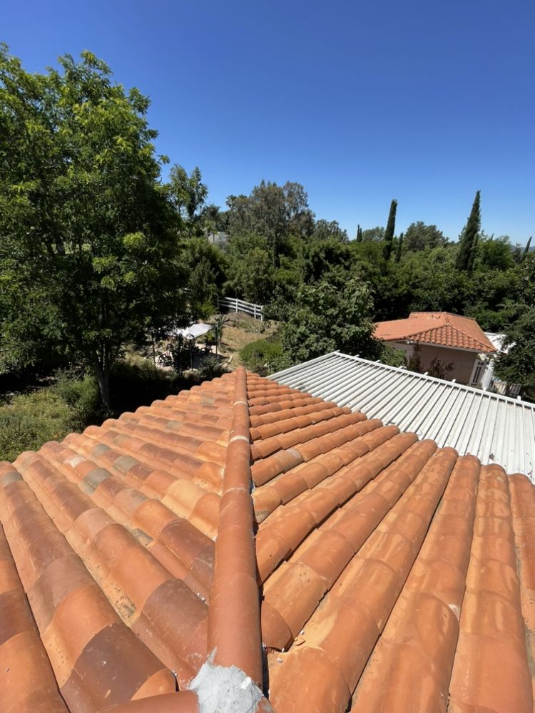 Slide of Venture Roofing