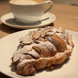 Copain Bakery & Provisions - Almond croissant and cappuccino