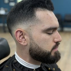 Traditional low bald fade and beard!