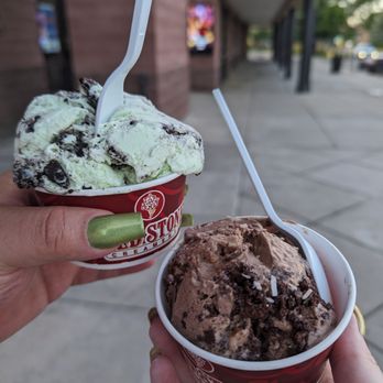 Cold Stone Creamery - a hand holding a cup of ice cream - Ice Cream & Frozen Yogurt Near Me - Loveland, Colorado