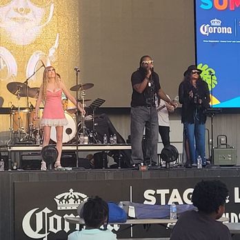 Stage & Lawn - Tin Man Band on stage - Music Venues Near Me - The Colony, Texas