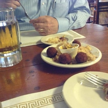 Brau Haus - Sauerkraut balls on a bed of kraut with mustard.... By the time I got the camera out, 2 of the 6 were being devoured - German Near Me - Oldenburg, Indiana Brau Haus - Sauerkraut balls on a bed of kraut with mustard.... By the time I got the camera out, 2 of the 6 were being devoured - German Near Me - Oldenburg, Indiana