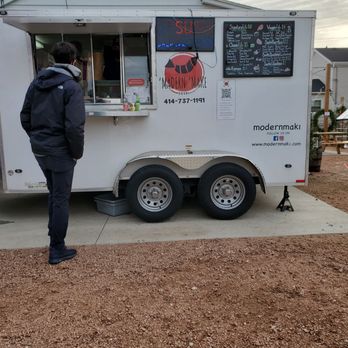Modern Maki - a man standing in front of a food truck - Sushi Bars Near Me - Milwaukee, Wisconsin