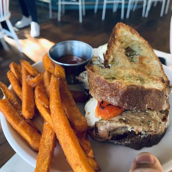 Naïve - Chicken Pesto Sandwich w/ sweet potato fries - New American Near Me - Louisville, Kentucky Naïve - Chicken Pesto Sandwich w/ sweet potato fries - New American Near Me - Louisville, Kentucky
