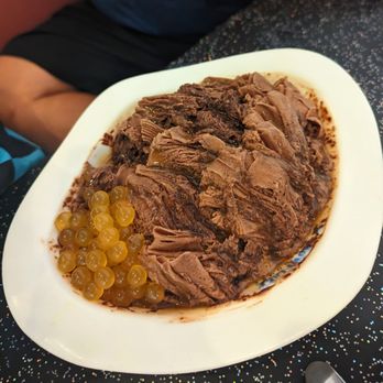 Snowflake Tea House - Chocolate snow with chocolate sauce and mango popping bubbles - Desserts Near Me - Duluth, Georgia