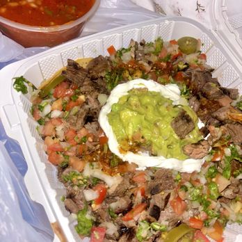Tere's Mexican Grill - Carne Asada Nachos, 12 oz spicy salsa - Mexican Near Me - Los Angeles, California Tere's Mexican Grill - Carne Asada Nachos, 12 oz spicy salsa - Mexican Near Me - Los Angeles, California