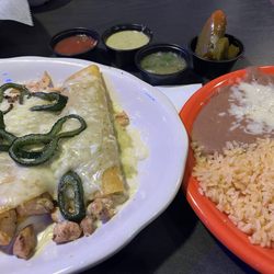 Enchiladas Poblanas with rice, refried beans