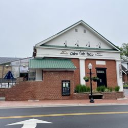 Cabo Fish Taco - Outside / Exterior pic of restaurant from across Main Street - outside patio seating to left of building