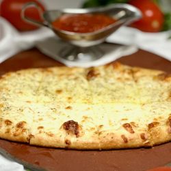 Pizzeria Zacharia Bar & Grill - Garlic Bread
With mozzarella served with our homemade sauce