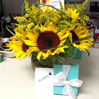 Sweet Leilani Flower Shop - 6in bubble bowl, 10 sunflowers - $65 - Floral Designers Near Me Sweet Leilani Flower Shop - 6in bubble bowl, 10 sunflowers - $65 - Floral Designers Near Me