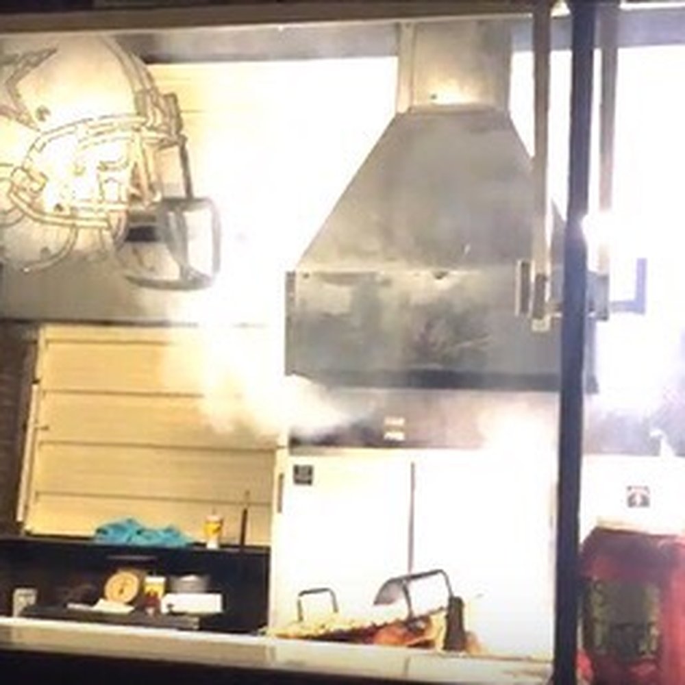 Big E's Barbeque - a man in a restaurant - Barbeque Near Me - Lubbock, Texas
